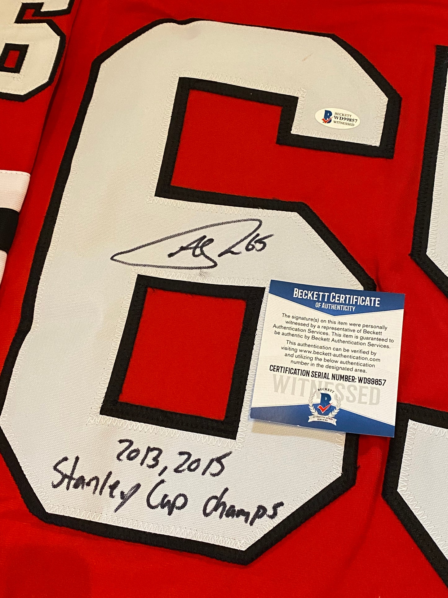 Andrew Shaw signed custom jersey inscribed "2013, 2015 Stanley Cup Champs" (Beckett COA)